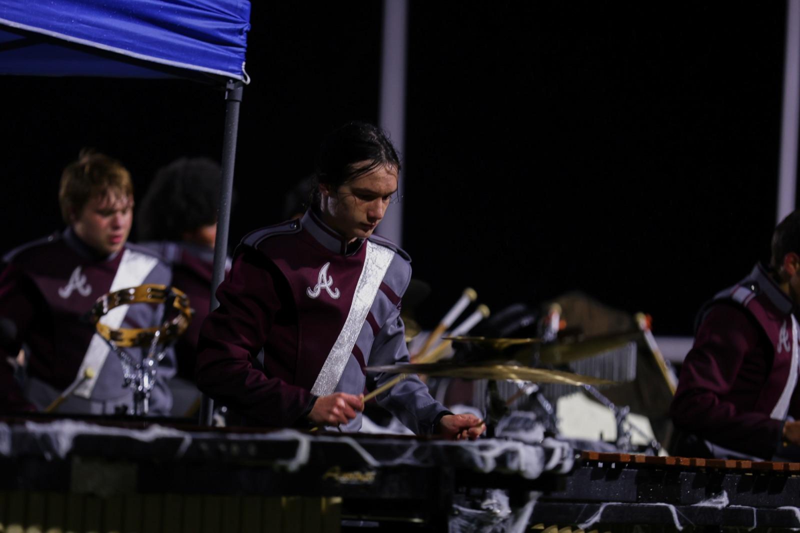 Front ensemble percussionist locked in on the marimba